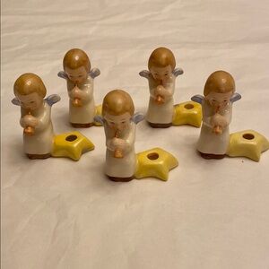Goebel tiny Angels, 4 available. Holds a candle. Bidding on 1.